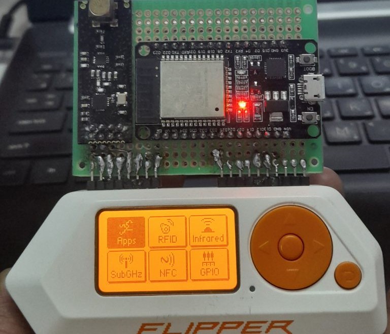 NRF24 and Node MCU board wired to a Flipper Zero showing the GPIO menu
